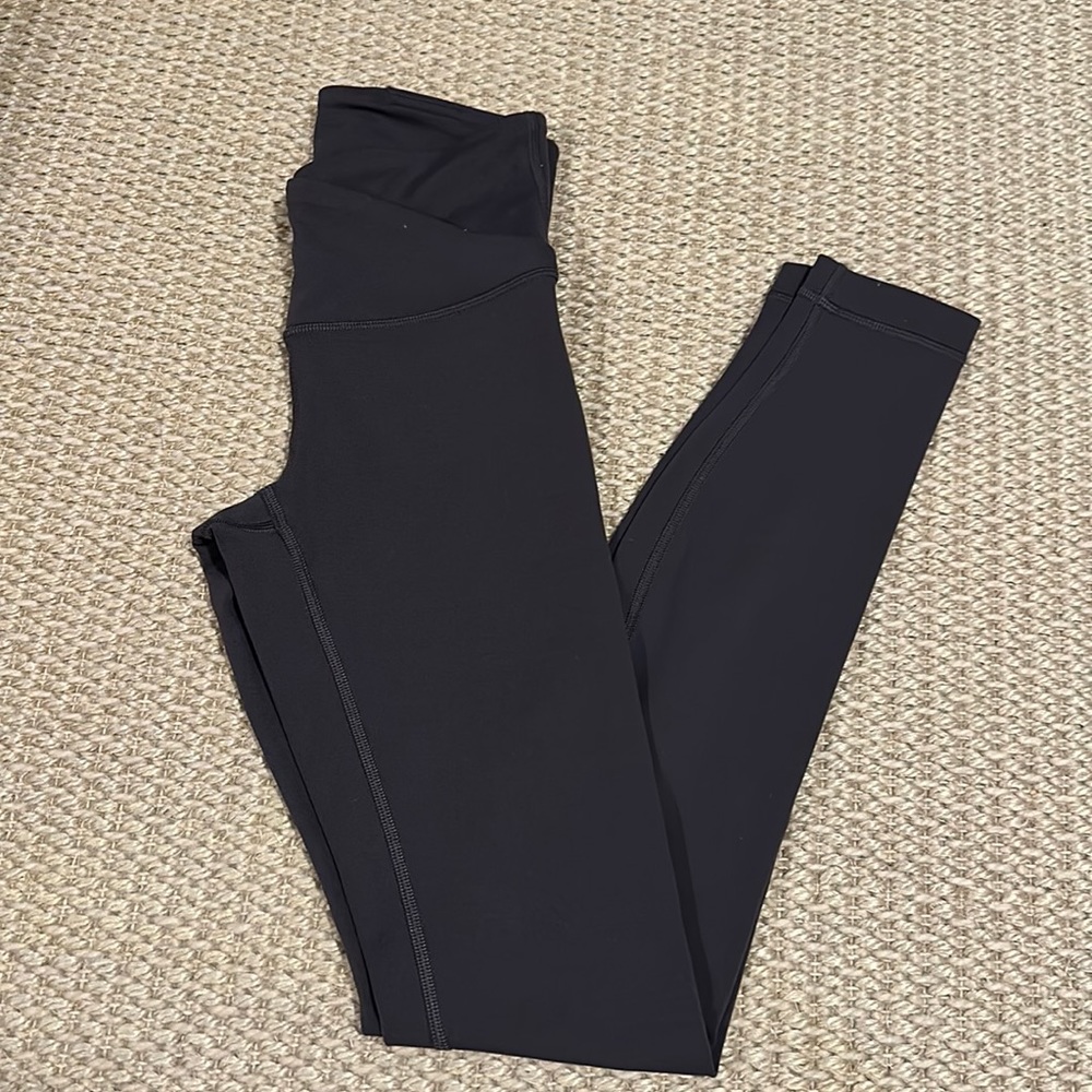 2 Lululemon Criss Cross Leggings in Purple